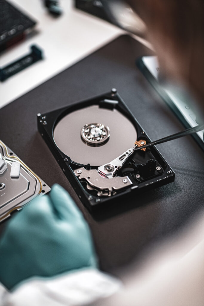 Forensic Science Data. Forensic Analyst Examining Computer Hard Drive.